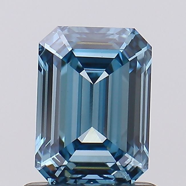 Loose Diamond - EMERALD 1.09ct Fancy Vivid Blue VS2: Loose Diamond - EMERALD 1.09ct Fancy Vivid Blue VS2 Source: This is a real non-mined Diamond that has been grown in a lab Shape: EMERALD Carats: 1.09 Color: Fancy Vivid Blue Certification: IGI Video: