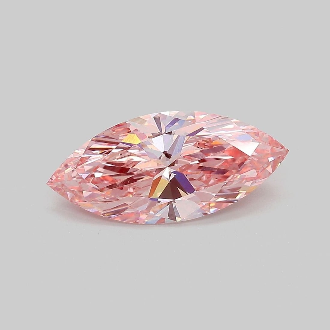 Loose Diamond - MARQUISE 2.1ct Fancy Vivid Pink VS2: Loose Diamond - MARQUISE 2.1ct Fancy Vivid Pink VS2 Source: This is a real non-mined Diamond that has been grown in a lab Shape: MARQUISE Carats: 2.1 Color: Fancy Vivid Pink Certification: IGI Video: