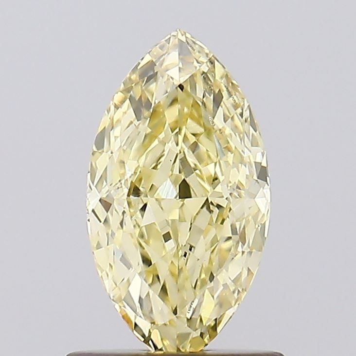 Loose Diamond - MARQUISE 1.02ct Fancy Yellow VVS2: Loose Diamond - MARQUISE 1.02ct Fancy Yellow VVS2 Source: This is a real non-mined Diamond that has been grown in a lab Shape: MARQUISE Carats: 1.02 Color: Fancy Yellow Certification: IGI Video: