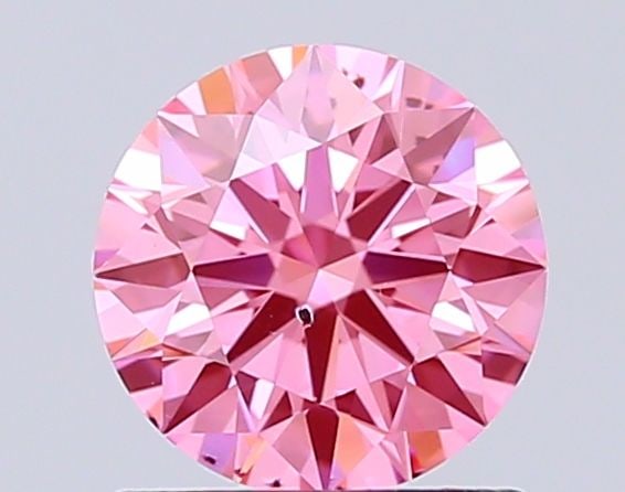 Ideal Loose Diamond - ROUND 1.04ct Fancy Vivid Pink SI2: Ideal Loose Diamond - ROUND 1.04ct Fancy Vivid Pink SI2 Source: This is a real non-mined Diamond that has been grown in a lab Shape: ROUND Carats: 1.04 Color: Fancy Vivid Pink Certification: IGI Video