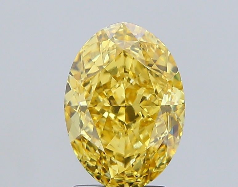 Loose Diamond - OVAL 3.25ct Fancy Intense Yellow VVS2: Loose Diamond - OVAL 3.25ct Fancy Intense Yellow VVS2 Source: This is a real non-mined Diamond that has been grown in a lab Shape: OVAL Carats: 3.25 Color: Fancy Intense Yellow Certification: IGI Vide