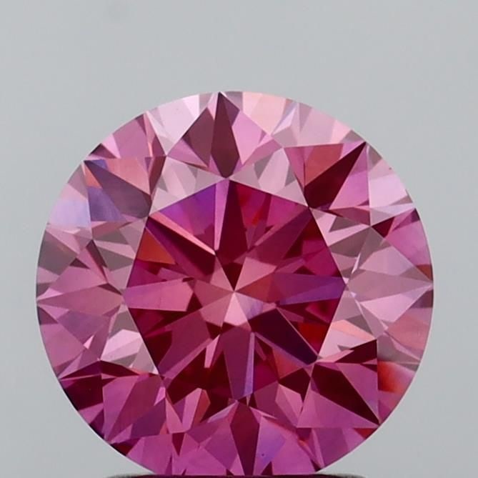 Ideal Loose Diamond - ROUND 2.07ct Fancy Vivid Pink VS1: Ideal Loose Diamond - ROUND 2.07ct Fancy Vivid Pink VS1 Source: This is a real non-mined Diamond that has been grown in a lab Shape: ROUND Carats: 2.07 Color: Fancy Vivid Pink Certification: IGI Video