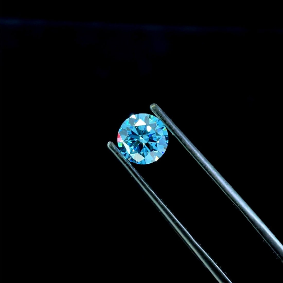 Ideal Loose Diamond - ROUND 1.49ct Fancy Vivid Blue VVS2: Ideal Loose Diamond - ROUND 1.49ct Fancy Vivid Blue VVS2 Source: This is a real non-mined Diamond that has been grown in a lab Shape: ROUND Carats: 1.49 Color: Fancy Vivid Blue Certification: IGI The 