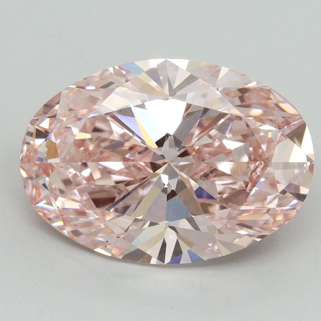 Loose Diamond - OVAL 5.04ct Fancy Vivid Pink VS1: Loose Diamond - OVAL 5.04ct Fancy Vivid Pink VS1 Source: This is a real non-mined Diamond that has been grown in a lab Shape: OVAL Carats: 5.04 Color: Fancy Vivid Pink Certification: IGI Video: