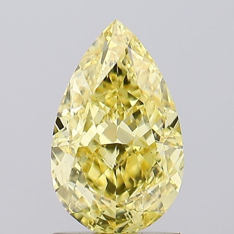 Loose Diamond - PEAR 1.55ct Fancy Vivid Yellow VS1: Loose Diamond - PEAR 1.55ct Fancy Vivid Yellow VS1 Source: This is a real non-mined Diamond that has been grown in a lab Shape: PEAR Carats: 1.55 Color: Fancy Vivid Yellow Certification: IGI Video: