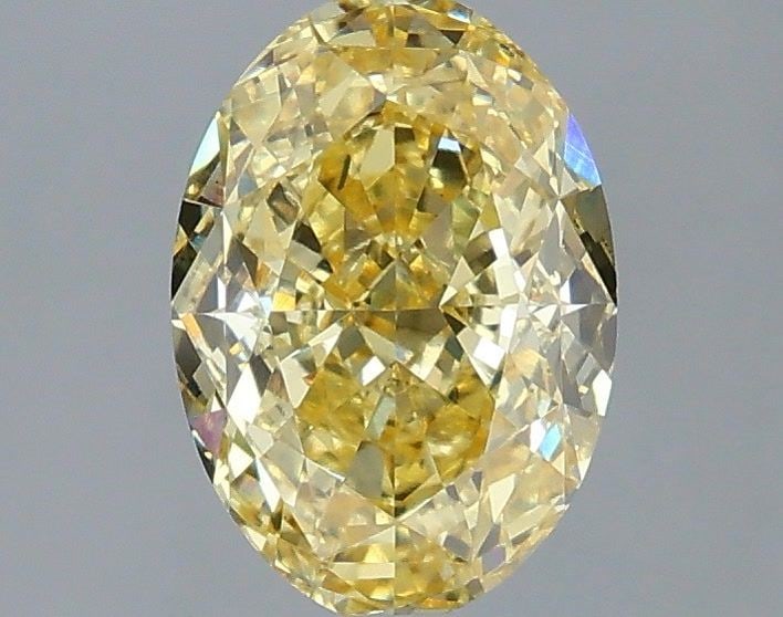 Loose Diamond - OVAL 2.1ct Fancy Vivid Yellow VS1: Loose Diamond - OVAL 2.1ct Fancy Vivid Yellow VS1 Source: This is a real non-mined Diamond that has been grown in a lab Shape: OVAL Carats: 2.1 Color: Fancy Vivid Yellow Certification: IGI Video: