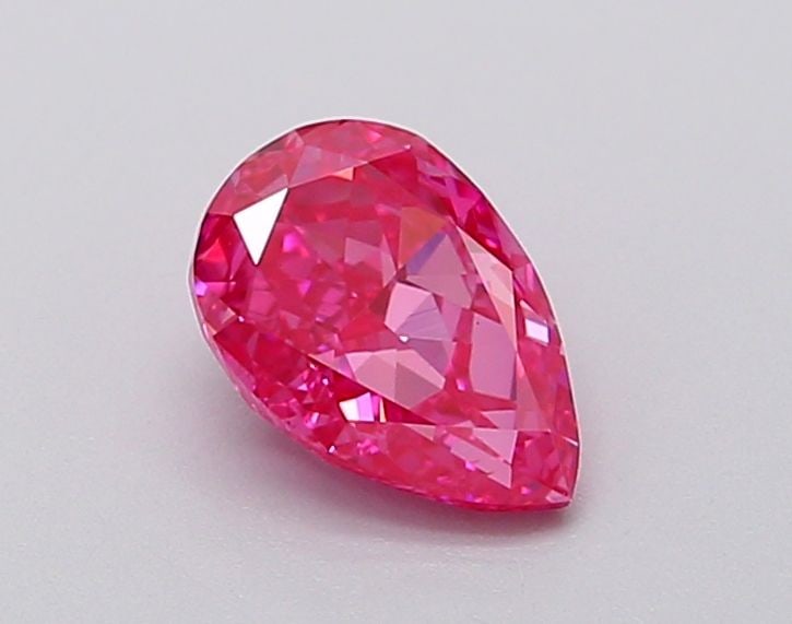 Loose Diamond - PEAR 0.77ct Fancy Vivid Pink VS1: Loose Diamond - PEAR 0.77ct Fancy Vivid Pink VS1 Source: This is a real non-mined Diamond that has been grown in a lab Shape: PEAR Carats: 0.77 Color: Fancy Vivid Pink Certification: IGI Video: