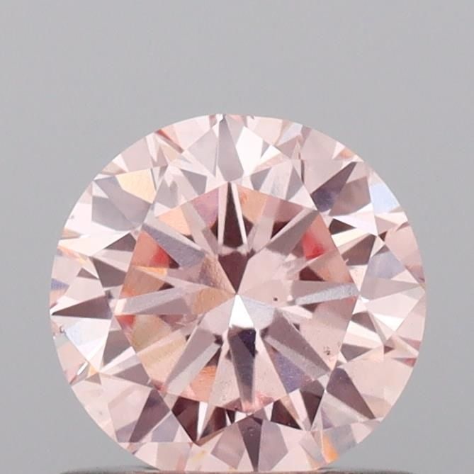 Loose Diamond - ROUND 0.7ct Fancy Intense Pink VS2: Loose Diamond - ROUND 0.7ct Fancy Intense Pink VS2 Source: This is a real non-mined Diamond that has been grown in a lab Shape: ROUND Carats: 0.7 Color: Fancy Intense Pink Certification: IGI Video: