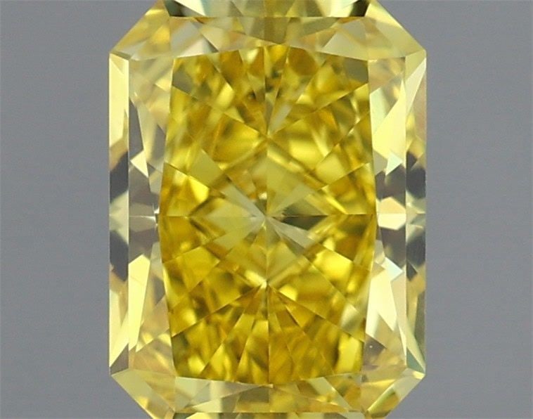 Loose Diamond - RADIANT 0.5ct Fancy Vivid Yellow VVS2: Loose Diamond - RADIANT 0.5ct Fancy Vivid Yellow VVS2 Source: This is a real non-mined Diamond that has been grown in a lab Shape: RADIANT Carats: 0.5 Color: Fancy Vivid Yellow Certification: IGI Vide
