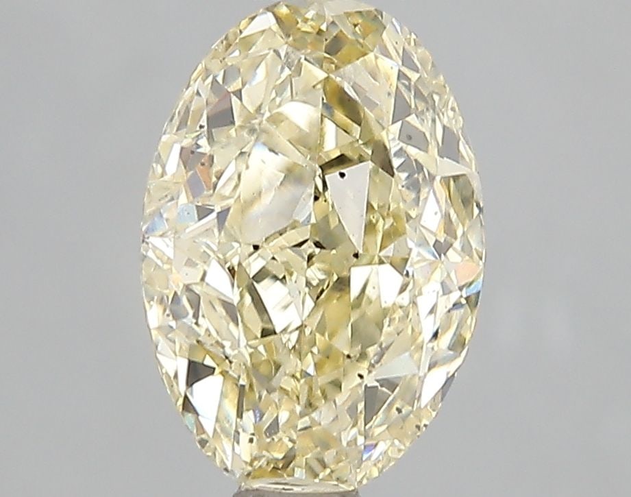 Loose Diamond - OVAL 2.51ct Fancy Intense Yellow SI1: Loose Diamond - OVAL 2.51ct Fancy Intense Yellow SI1 Source: This is a real non-mined Diamond that has been grown in a lab Shape: OVAL Carats: 2.51 Color: Fancy Intense Yellow Certification: IGI Video