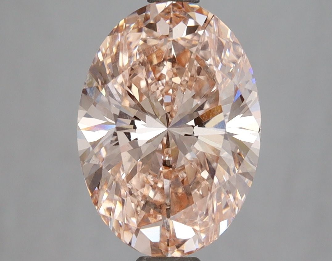 Loose Diamond - OVAL 3.07ct Fancy Intense Orangey Pink VS1: Loose Diamond - OVAL 3.07ct Fancy Intense Orangey Pink VS1 Source: This is a real non-mined Diamond that has been grown in a lab Shape: OVAL Carats: 3.07 Color: Fancy Intense Orangey Pink Certificatio