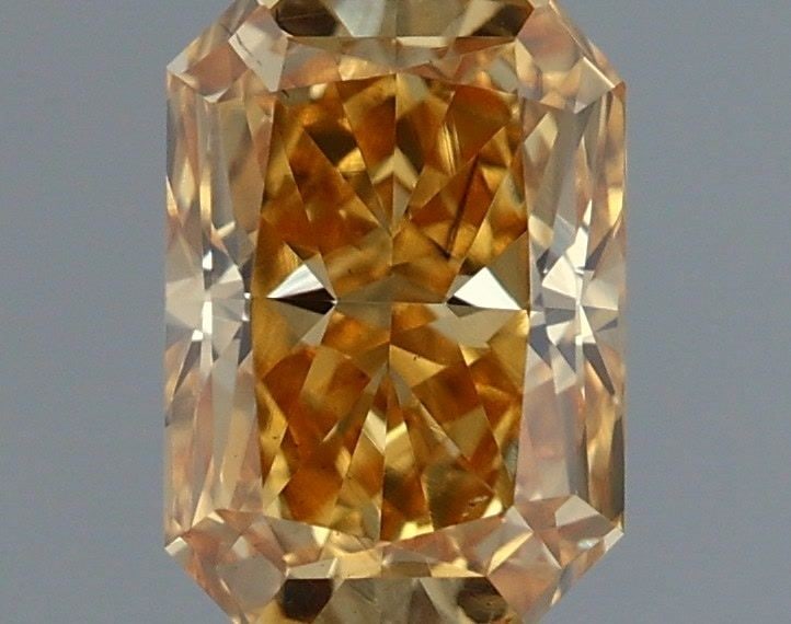Loose Diamond - RADIANT 0.54ct Fancy Intense Brownish Yellow VS2: Loose Diamond - RADIANT 0.54ct Fancy Intense Brownish Yellow VS2 Source: This is a real non-mined Diamond that has been grown in a lab Shape: RADIANT Carats: 0.54 Color: Fancy Intense Brownish Yellow 