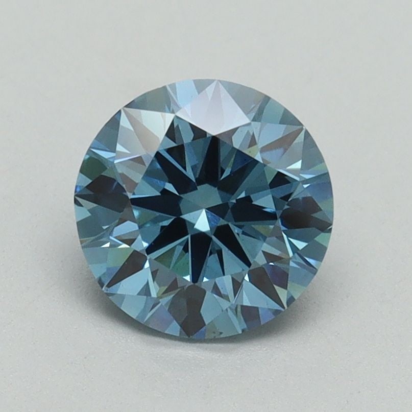 Ideal Loose Diamond - ROUND 1.18ct Fancy Vivid Blue VS1: Ideal Loose Diamond - ROUND 1.18ct Fancy Vivid Blue VS1 Source: This is a real non-mined Diamond that has been grown in a lab Shape: ROUND Carats: 1.18 Color: Fancy Vivid Blue Certification: IGI