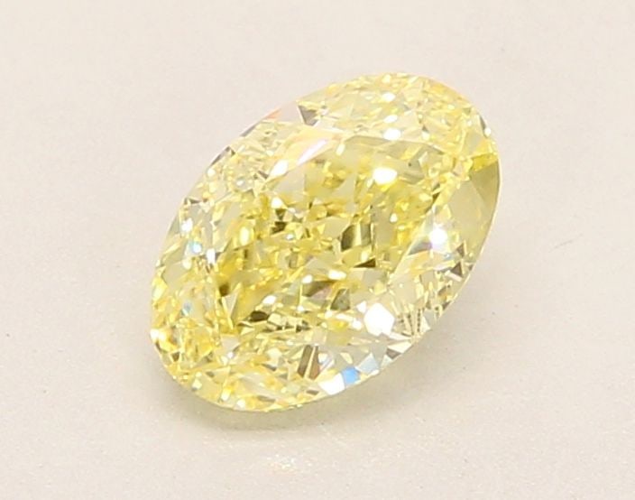 Loose Diamond - OVAL 1.06ct Fancy Yellow VVS2: Loose Diamond - OVAL 1.06ct Fancy Yellow VVS2 Source: This is a real non-mined Diamond that has been grown in a lab Shape: OVAL Carats: 1.06 Color: Fancy Yellow Certification: IGI Video: