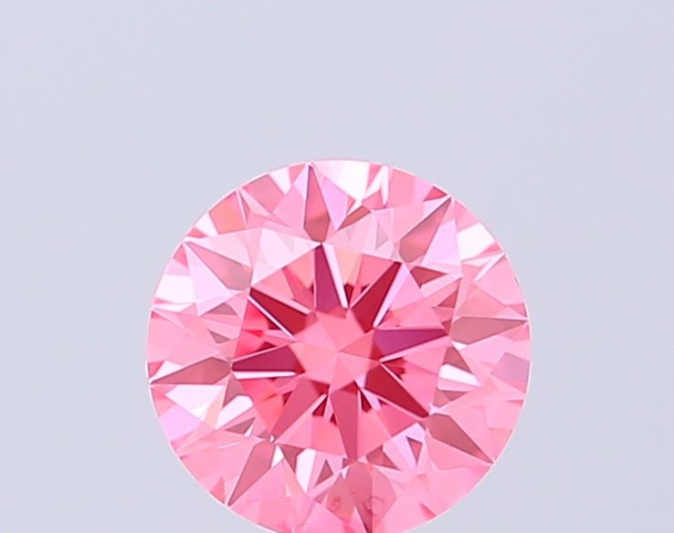 Ideal Loose Diamond - ROUND 0.55ct Fancy Vivid Pink VVS2: Ideal Loose Diamond - ROUND 0.55ct Fancy Vivid Pink VVS2 Source: This is a real non-mined Diamond that has been grown in a lab Shape: ROUND Carats: 0.55 Color: Fancy Vivid Pink Certification: IGI The 