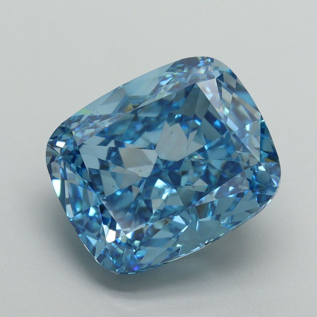 Loose Diamond - CUSHION MODIFIED 11.56ct Fancy Vivid Blue VS1: Loose Diamond - CUSHION MODIFIED 11.56ct Fancy Vivid Blue VS1 Source: This is a real non-mined Diamond that has been grown in a lab Shape: CUSHION MODIFIED Carats: 11.56 Color: Fancy Vivid Blue Certif