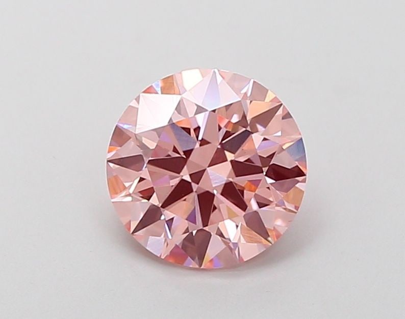 Ideal Loose Diamond - ROUND 1.51ct Fancy Vivid Pink VS1: Ideal Loose Diamond - ROUND 1.51ct Fancy Vivid Pink VS1 Source: This is a real non-mined Diamond that has been grown in a lab Shape: ROUND Carats: 1.51 Color: Fancy Vivid Pink Certification: IGI Video
