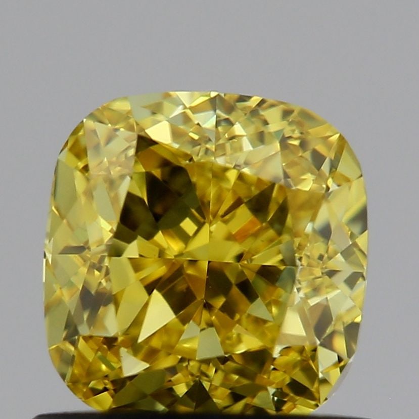 Loose Diamond - CUSHION MODIFIED 0.9ct Fancy Intense Yellow VS1: Loose Diamond - CUSHION MODIFIED 0.9ct Fancy Intense Yellow VS1 Source: This is a real non-mined Diamond that has been grown in a lab Shape: CUSHION MODIFIED Carats: 0.9 Color: Fancy Intense Yellow Ce
