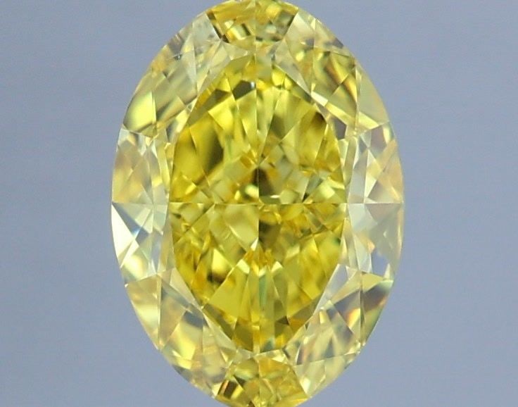 Loose Diamond - OVAL 1.26ct Fancy Vivid Yellow VVS1: Loose Diamond - OVAL 1.26ct Fancy Vivid Yellow VVS1 Source: This is a real non-mined Diamond that has been grown in a lab Shape: OVAL Carats: 1.26 Color: Fancy Vivid Yellow Certification: IGI Video:
