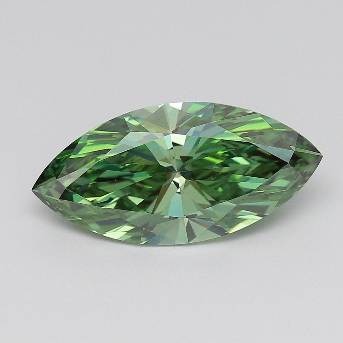 Loose Diamond - MARQUISE 5.07ct Fancy Vivid Green VVS2: Loose Diamond - MARQUISE 5.07ct Fancy Vivid Green VVS2 Source: This is a real non-mined Diamond that has been grown in a lab Shape: MARQUISE Carats: 5.07 Color: Fancy Vivid Green Certification: IGI Vi