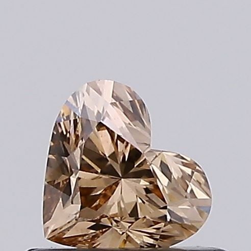 Loose Diamond - HEART 0.49ct Fancy Vivid Brown VVS2: Loose Diamond - HEART 0.49ct Fancy Vivid Brown VVS2 Source: This is a real non-mined Diamond that has been grown in a lab Shape: HEART Carats: 0.49 Color: Fancy Vivid Brown Certification: NONE Video: