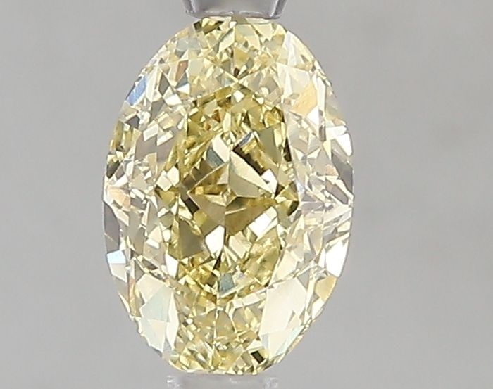 Loose Diamond - OVAL 1.01ct Fancy Intense Yellow VVS2: Loose Diamond - OVAL 1.01ct Fancy Intense Yellow VVS2 Source: This is a real non-mined Diamond that has been grown in a lab Shape: OVAL Carats: 1.01 Color: Fancy Intense Yellow Certification: IGI Vide