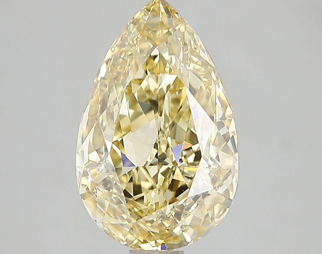 Loose Diamond - PEAR 3.01ct Fancy Vivid Yellow VS2: Loose Diamond - PEAR 3.01ct Fancy Vivid Yellow VS2 Source: This is a real non-mined Diamond that has been grown in a lab Shape: PEAR Carats: 3.01 Color: Fancy Vivid Yellow Certification: IGI Video: