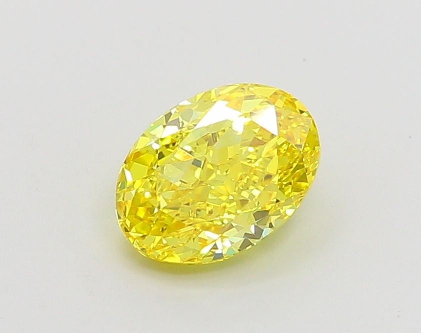 Loose Diamond - OVAL 1.65ct Fancy Vivid Yellow VS1: Loose Diamond - OVAL 1.65ct Fancy Vivid Yellow VS1 Source: This is a real non-mined Diamond that has been grown in a lab Shape: OVAL Carats: 1.65 Color: Fancy Vivid Yellow Certification: IGI Video: