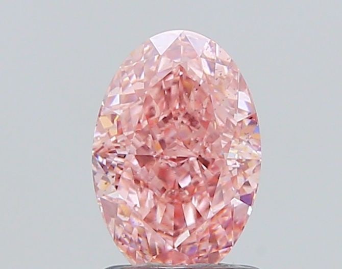 Loose Diamond - OVAL 1.52ct Fancy Vivid Pink SI1: Loose Diamond - OVAL 1.52ct Fancy Vivid Pink SI1 Source: This is a real non-mined Diamond that has been grown in a lab Shape: OVAL Carats: 1.52 Color: Fancy Vivid Pink Certification: IGI Video: