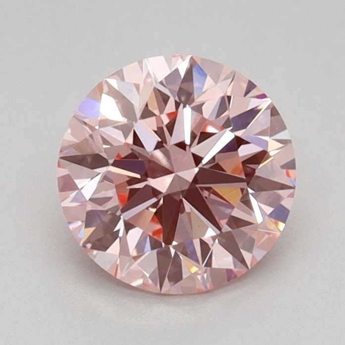 Ideal Loose Diamond - ROUND 0.74ct Fancy Vivid Pink VVS2: Ideal Loose Diamond - ROUND 0.74ct Fancy Vivid Pink VVS2 Source: This is a real non-mined Diamond that has been grown in a lab Shape: ROUND Carats: 0.74 Color: Fancy Vivid Pink Certification: IGI Vide