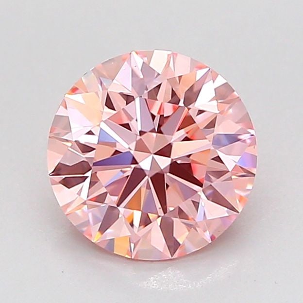 Ideal Loose Diamond - ROUND 1.5ct Fancy Vivid Pink VS1: Ideal Loose Diamond - ROUND 1.5ct Fancy Vivid Pink VS1 Source: This is a real non-mined Diamond that has been grown in a lab Shape: ROUND Carats: 1.5 Color: Fancy Vivid Pink Certification: IGI Video: