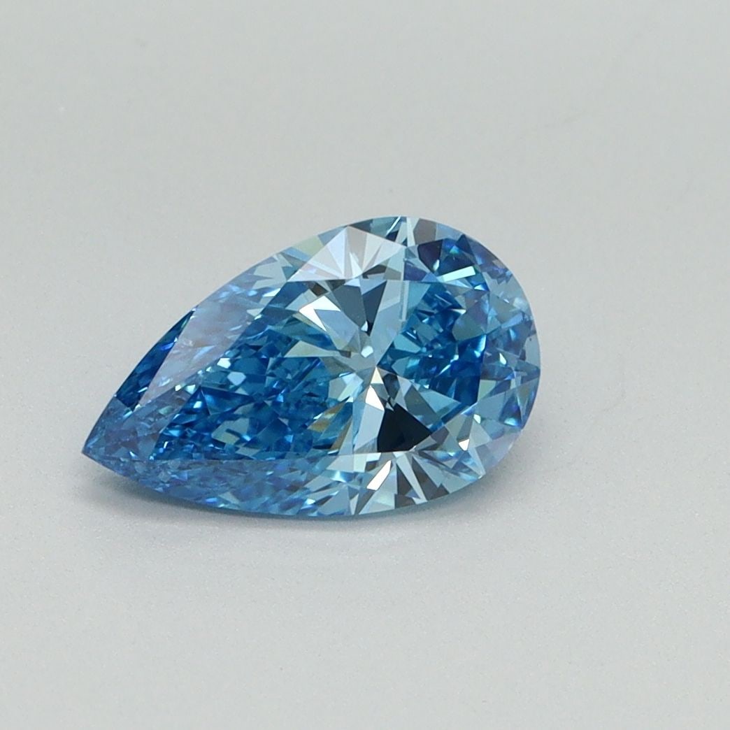 Loose Diamond - PEAR 1.0ct Fancy Vivid Blue VS2: Loose Diamond - PEAR 1.0ct Fancy Vivid Blue VS2 Source: This is a real non-mined Diamond that has been grown in a lab Shape: PEAR Carats: 1.0 Color: Fancy Vivid Blue Certification: IGI Video: