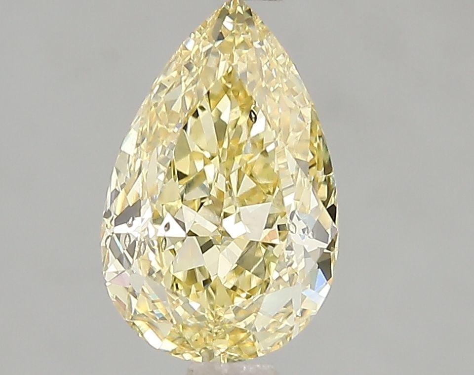 Loose Diamond - PEAR 2.02ct Fancy Vivid Yellow SI1: Loose Diamond - PEAR 2.02ct Fancy Vivid Yellow SI1 Source: This is a real non-mined Diamond that has been grown in a lab Shape: PEAR Carats: 2.02 Color: Fancy Vivid Yellow Certification: IGI Video:
