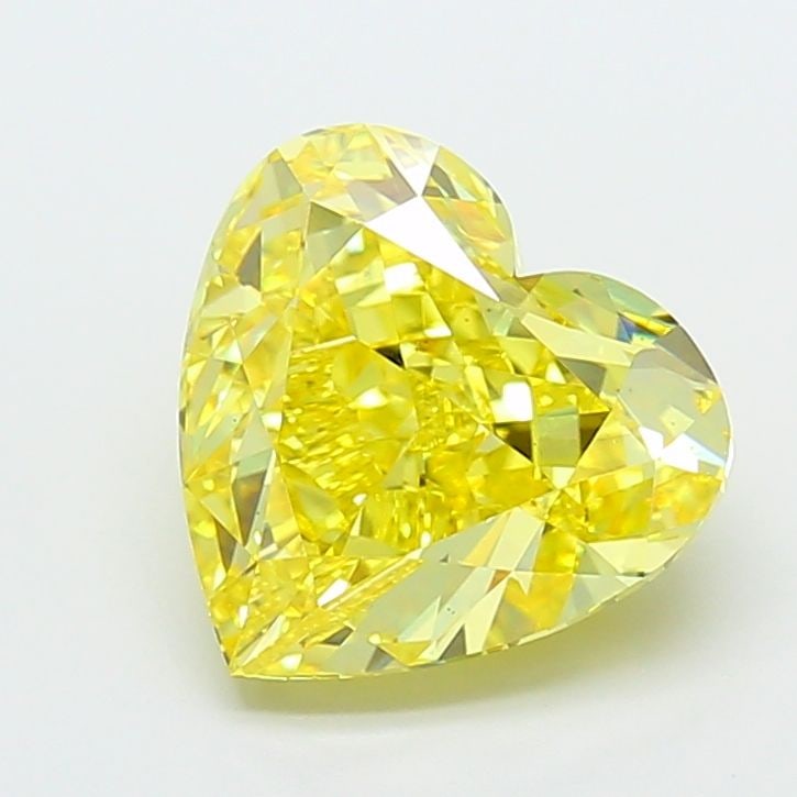Loose Diamond - HEART 5.04ct Fancy Vivid Yellow VS2: Loose Diamond - HEART 5.04ct Fancy Vivid Yellow VS2 Source: This is a real non-mined Diamond that has been grown in a lab Shape: HEART Carats: 5.04 Color: Fancy Vivid Yellow Certification: IGI Video: