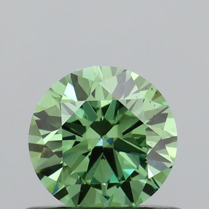 Loose Diamond - ROUND 0.54ct Fancy Vivid Green VS1: Loose Diamond - ROUND 0.54ct Fancy Vivid Green VS1 Source: This is a real non-mined Diamond that has been grown in a lab Shape: ROUND Carats: 0.54 Color: Fancy Vivid Green Certification: IGI Video: