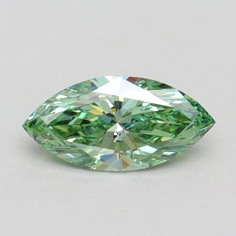 Loose Diamond - MARQUISE 0.61ct Fancy Vivid Green VS2: Loose Diamond - MARQUISE 0.61ct Fancy Vivid Green VS2 Source: This is a real non-mined Diamond that has been grown in a lab Shape: MARQUISE Carats: 0.61 Color: Fancy Vivid Green Certification: IGI Vid