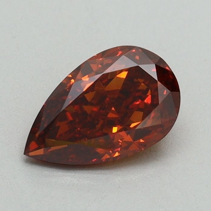 Loose Diamond - PEAR 0.71ct Fancy Orange VS1: Loose Diamond - PEAR 0.71ct Fancy Orange VS1 Source: This is a real non-mined Diamond that has been grown in a lab Shape: PEAR Carats: 0.71 Color: Fancy Orange Certification: IGI Video: