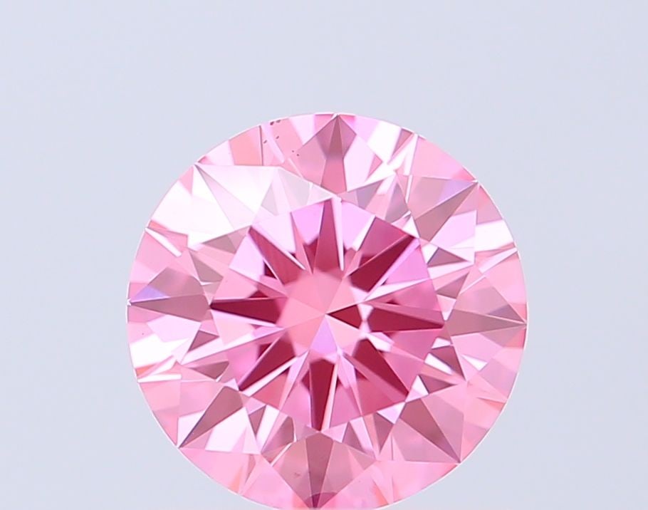Ideal Loose Diamond - ROUND 1.04ct Fancy Vivid Pink VS1: Ideal Loose Diamond - ROUND 1.04ct Fancy Vivid Pink VS1 Source: This is a real non-mined Diamond that has been grown in a lab Shape: ROUND Carats: 1.04 Color: Fancy Vivid Pink Certification: IGI Video