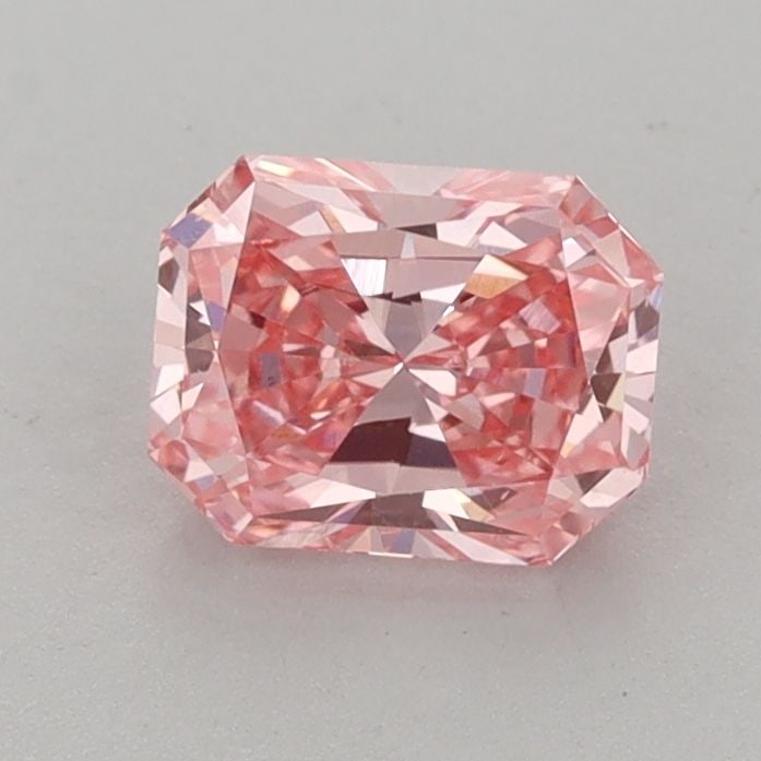 Loose Diamond - RADIANT 0.98ct Fancy Vivid Pink VS2: Loose Diamond - RADIANT 0.98ct Fancy Vivid Pink VS2 Source: This is a real non-mined Diamond that has been grown in a lab Shape: RADIANT Carats: 0.98 Color: Fancy Vivid Pink Certification: IGI Video: