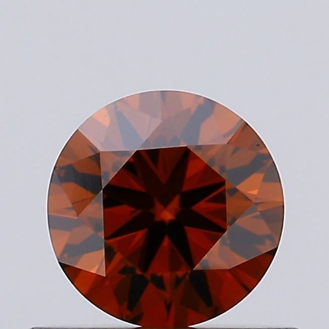Loose Diamond - ROUND 0.4ct Fancy Deep Orange VVS2: Loose Diamond - ROUND 0.4ct Fancy Deep Orange VVS2 Source: This is a real non-mined Diamond that has been grown in a lab Shape: ROUND Carats: 0.4 Color: Fancy Deep Orange Certification: IGI Video: