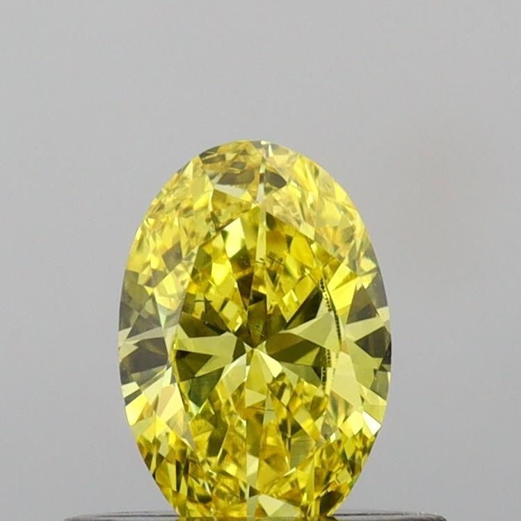 Loose Diamond - OVAL 0.44ct Fancy Vivid Yellow VS2: Loose Diamond - OVAL 0.44ct Fancy Vivid Yellow VS2 Source: This is a real non-mined Diamond that has been grown in a lab Shape: OVAL Carats: 0.44 Color: Fancy Vivid Yellow Certification: IGI Video: