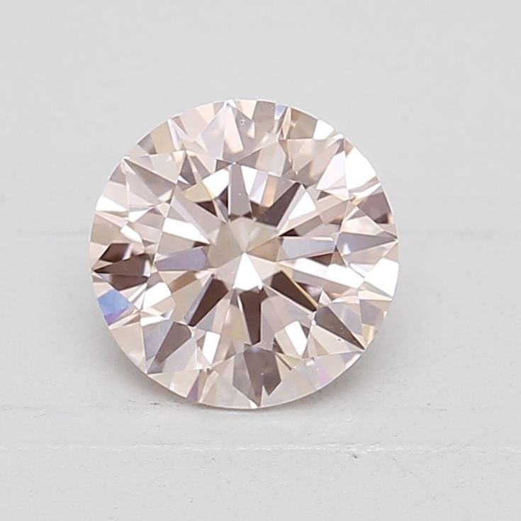 Ideal Loose Diamond - ROUND 1.36ct Fancy Pink VVS2: Ideal Loose Diamond - ROUND 1.36ct Fancy Pink VVS2 Source: This is a real non-mined Diamond that has been grown in a lab Shape: ROUND Carats: 1.36 Color: Fancy Pink Certification: IGI Video: