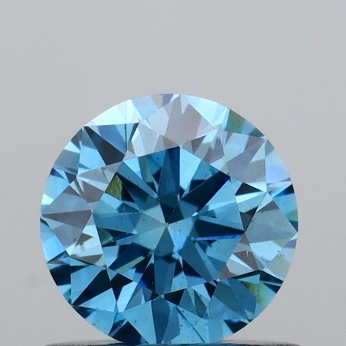 Loose Diamond - ROUND 0.63ct Fancy Vivid Blue VS2: Loose Diamond - ROUND 0.63ct Fancy Vivid Blue VS2 Source: This is a real non-mined Diamond that has been grown in a lab Shape: ROUND Carats: 0.63 Color: Fancy Vivid Blue Certification: IGI Video: