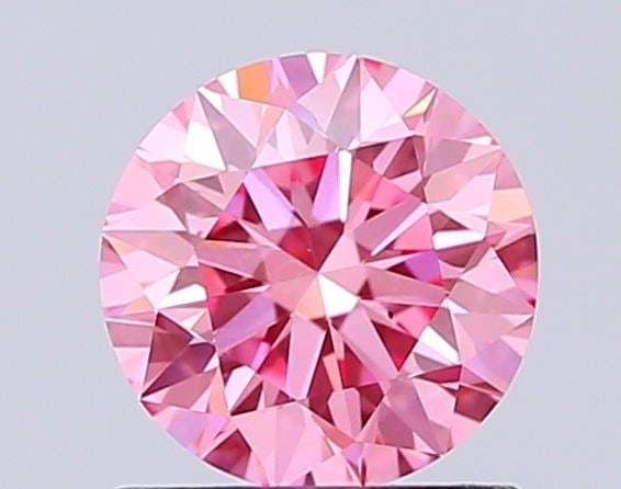 Loose Diamond - ROUND 1.0ct Fancy Vivid Pink VS2: Loose Diamond - ROUND 1.0ct Fancy Vivid Pink VS2 Source: This is a real non-mined Diamond that has been grown in a lab Shape: ROUND Carats: 1.0 Color: Fancy Vivid Pink Certification: IGI Video: