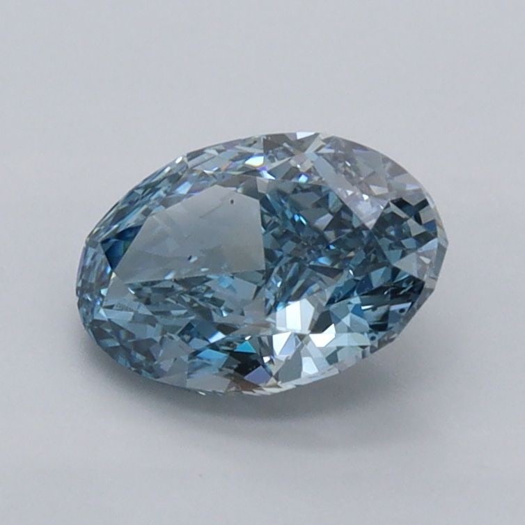 Loose Diamond - OVAL 1.04ct Fancy Vivid Blue VVS2: Loose Diamond - OVAL 1.04ct Fancy Vivid Blue VVS2 Source: This is a real non-mined Diamond that has been grown in a lab Shape: OVAL Carats: 1.04 Color: Fancy Vivid Blue Certification: IGI Video: