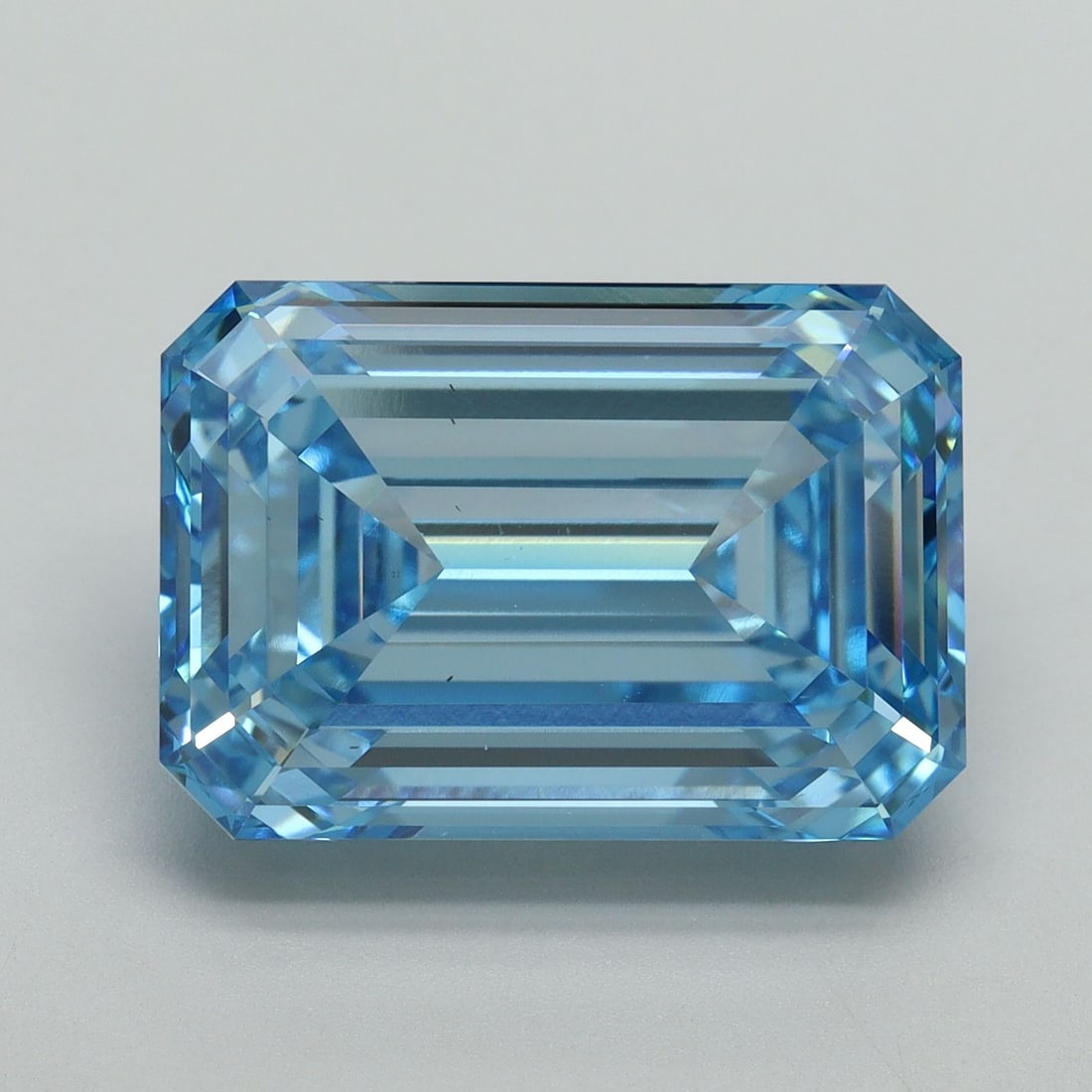 Loose Diamond - EMERALD 10.72ct Fancy Vivid Blue VS1: Loose Diamond - EMERALD 10.72ct Fancy Vivid Blue VS1 Source: This is a real non-mined Diamond that has been grown in a lab Shape: EMERALD Carats: 10.72 Color: Fancy Vivid Blue Certification: IGI Video