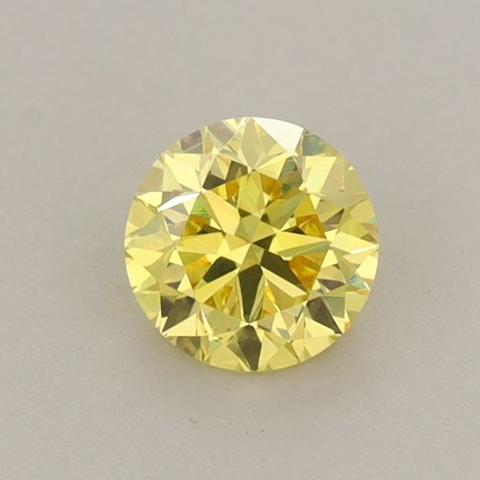 Loose Diamond - ROUND 0.54ct Fancy Vivid Yellow VS1: Loose Diamond - ROUND 0.54ct Fancy Vivid Yellow VS1 Source: This is a real non-mined Diamond that has been grown in a lab Shape: ROUND Carats: 0.54 Color: Fancy Vivid Yellow Certification: IGI Video: