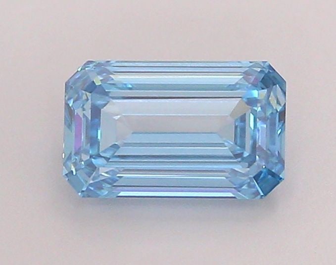 Loose Diamond - EMERALD 1.38ct Fancy Vivid Blue VS1: Loose Diamond - EMERALD 1.38ct Fancy Vivid Blue VS1 Source: This is a real non-mined Diamond that has been grown in a lab Shape: EMERALD Carats: 1.38 Color: Fancy Vivid Blue Certification: IGI Video: