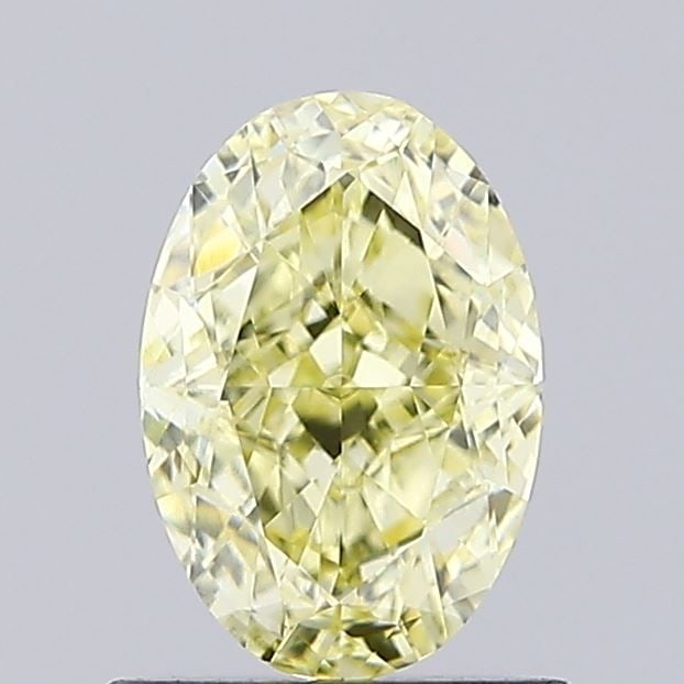 Loose Diamond - OVAL 0.87ct Fancy Yellow VVS2: Loose Diamond - OVAL 0.87ct Fancy Yellow VVS2 Source: This is a real non-mined Diamond that has been grown in a lab Shape: OVAL Carats: 0.87 Color: Fancy Yellow Certification: IGI Video: