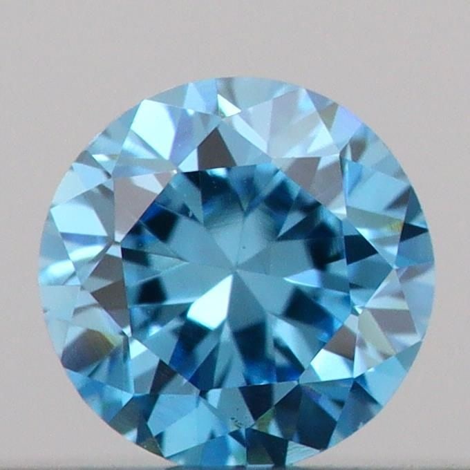 Loose Diamond - ROUND 0.13ct Fancy Vivid Blue VS1: Loose Diamond - ROUND 0.13ct Fancy Vivid Blue VS1 Source: This is a real non-mined Diamond that has been grown in a lab Shape: ROUND Carats: 0.13 Color: Fancy Vivid Blue Certification: IGI Video: